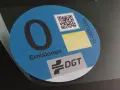 Pegatina de "0 Emisiones" de la DGT, distintivo para coches cero emisiones.
