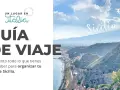 Guía de viaje para organizar tu aventura en Sicilia. Paisaje costero con el Etna al fondo.