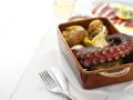 Pulpo asado con patatas y limón, una delicia para saber donde comer en Guimarães.