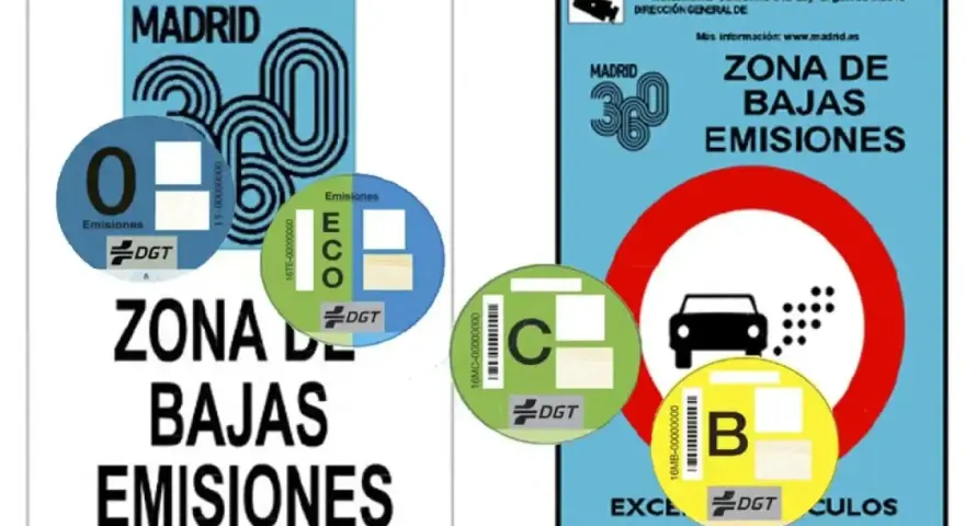 Pegatinas DGT para saber si mi coche es de bajas emisiones en Madrid. Muestran las categorías 0, ECO, C y B.