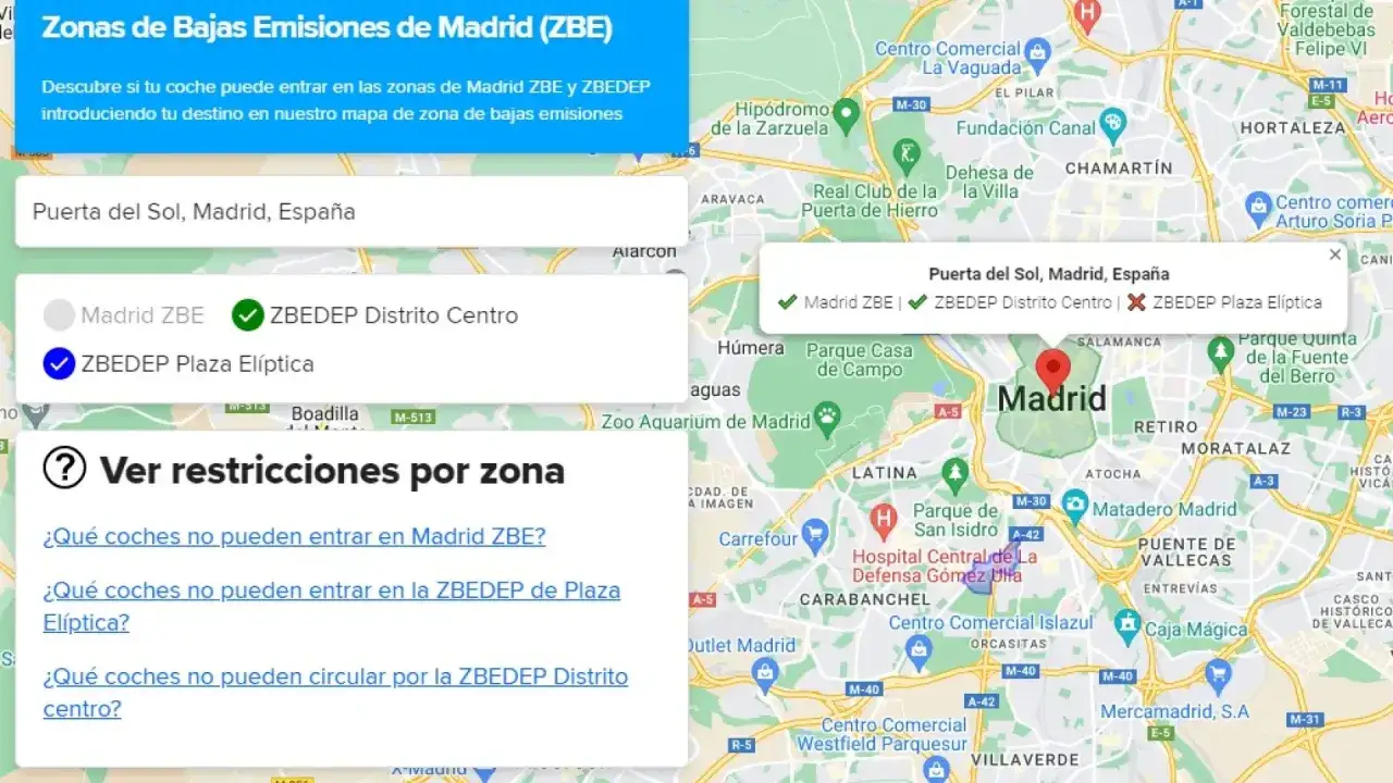 Mapa de Madrid mostrando la Puerta del Sol y las zonas ZBE. Se indica que el coche puede entrar en la ZBEDEP Distrito Centro.